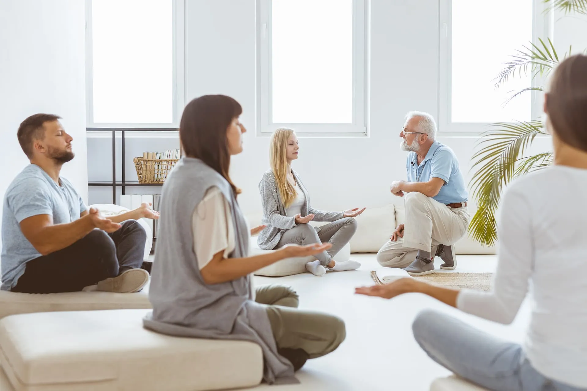 People meditating in a circle